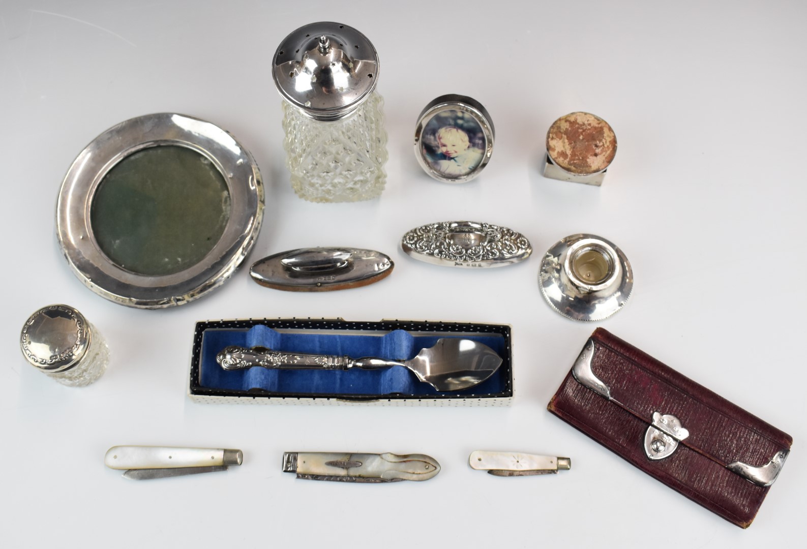 Hallmarked silver mounted items to include sugar sifter, photograph frames, matchbox holder, nail - Image 2 of 11