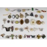 A collection of vintage brooches including marcasite, A & S, Jacobite, Sarah Coventry, silver set