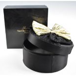 Van Cleef & Arpels hat box with gold bow to lid, in original box