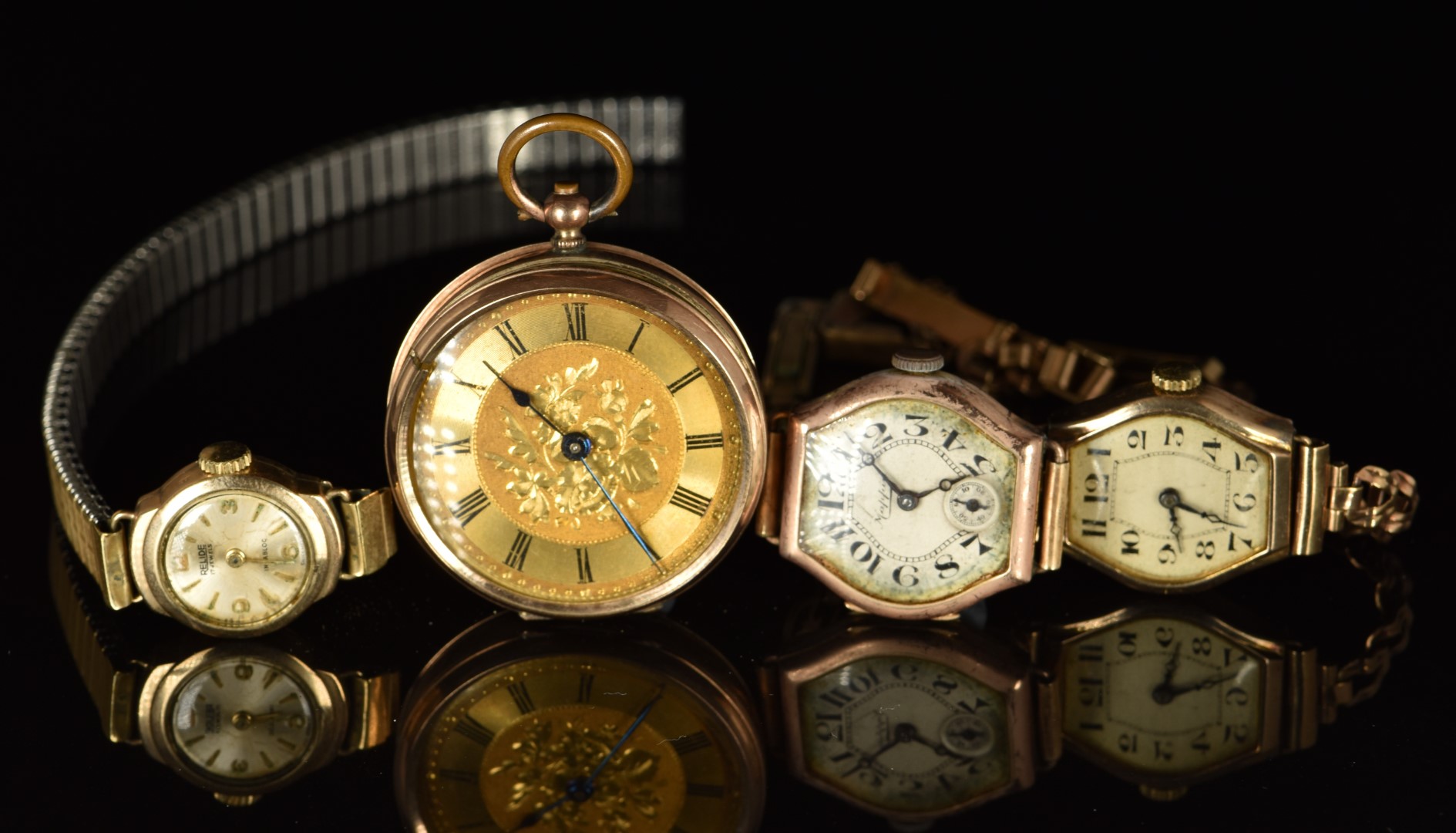 Four various 9ct gold watches comprising three ladies wristwatches and a open faced pocket watch,