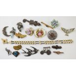 A collection of jewellery including two 9ct gold bar brooches (4.4g), silver, marcasite, carved bone