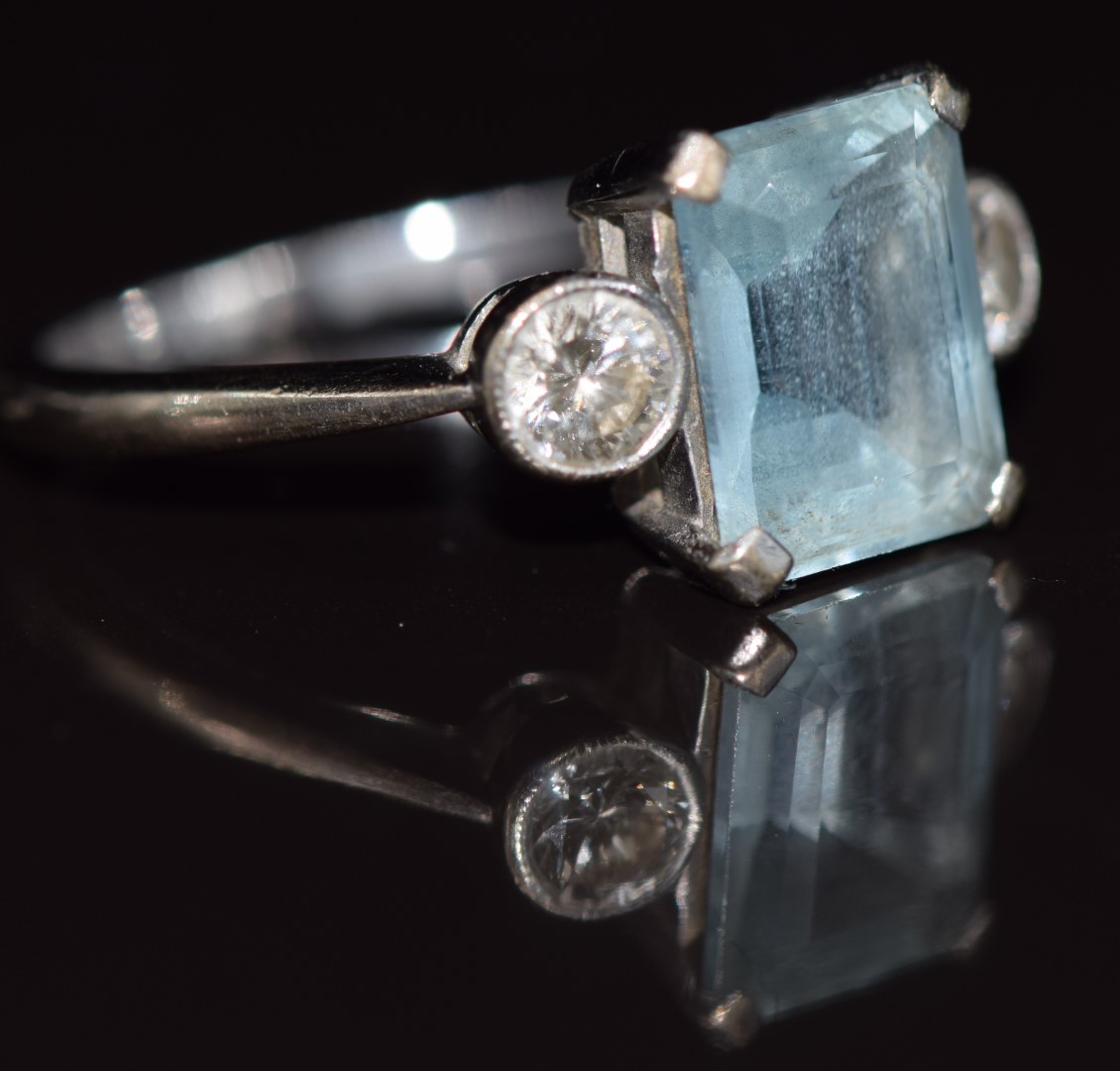 An 18ct white gold ring set with an emerald cut aquamarine of approximately 2.6ct and two - Image 2 of 2