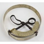 Vintage shop hat measuring tool with scissor type mechanism