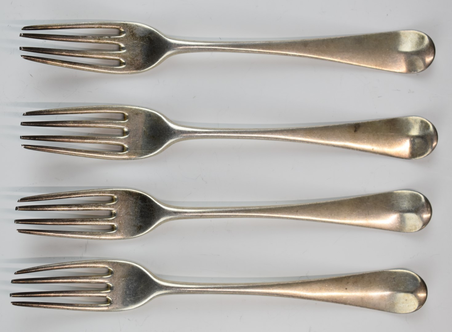 Set of four Georgian hallmarked silver Old English pattern table forks, London 1786, maker's mark