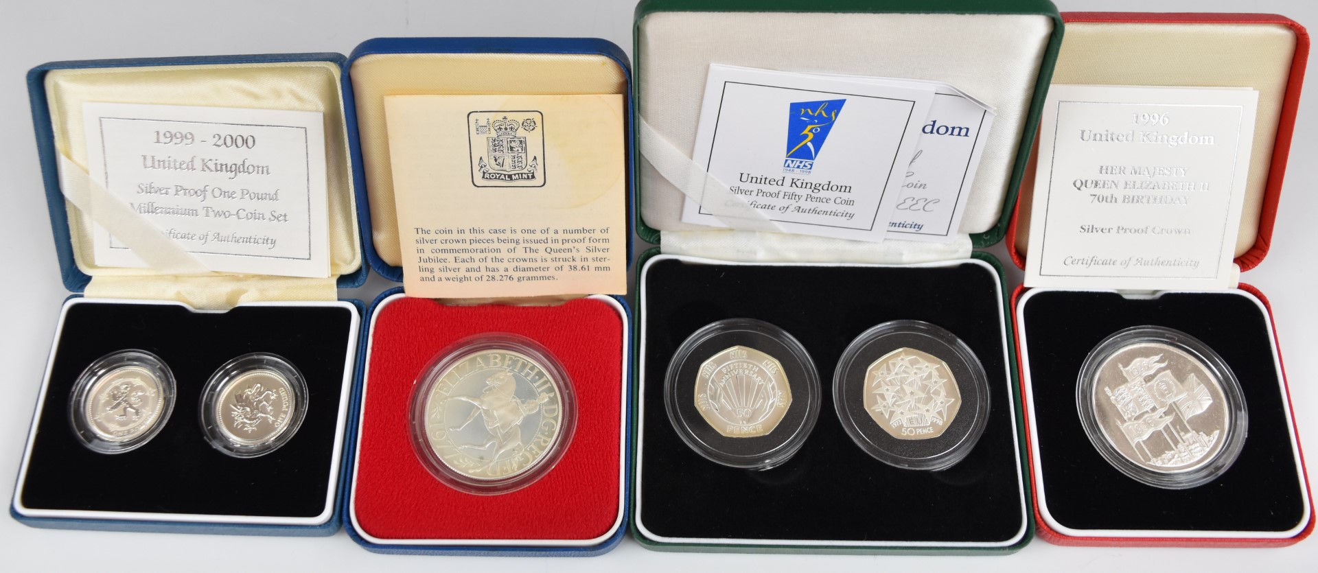 Six Royal Mint commemorative silver proof coins comprising a 1999 - 2000 set of two Millennium £1