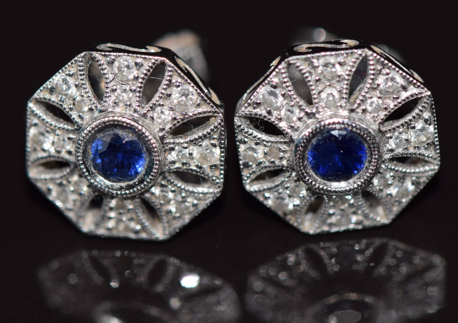 A pair of 18ct white gold earrings set with a sapphire and diamonds in a pierced setting, 4.1g 1. - Image 2 of 3