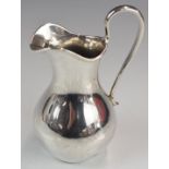 Russian silver jug of bulbous form, with 84 grade silver and St. Petersburg assay marks, height