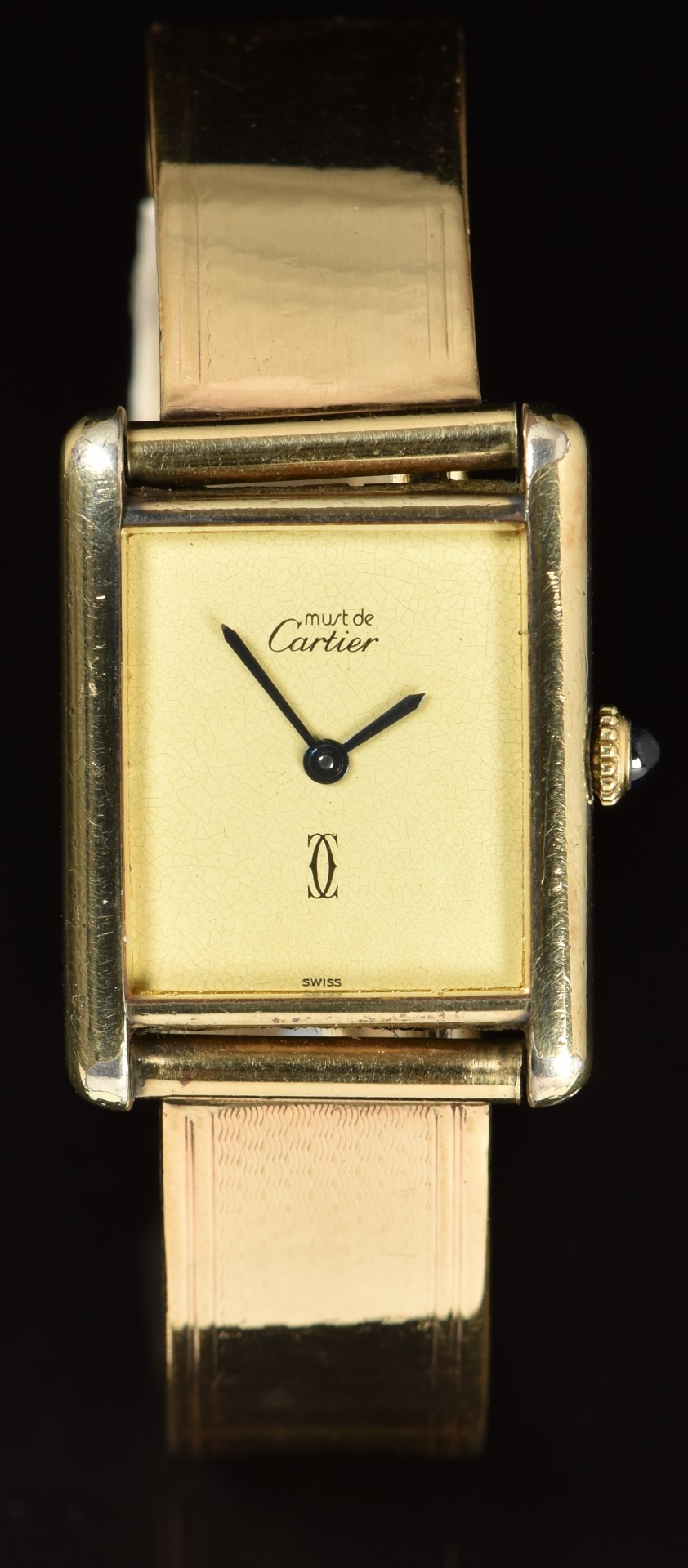 Must de Cartier silver gilt wristwatch with gold dial, blued hands, sapphire set crown and quartz