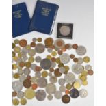 A quantity of overseas and UK coins including modern crowns, £5 examples, decimal sets, cased