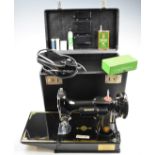 Singer 221K1 featherweight sewing machine, in original carry case with instructions, accessories,