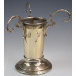 American silver epergne or centrepiece with three hanging loops surrounding a central vase holder,