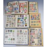 A large collection of GB, Commonwealth and world mint and used stamps in various albums and