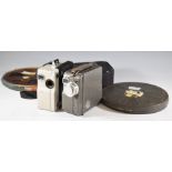 Pathescope H and Prince 9.5mm cine camera and two reels of film, one labelled Charlie Chaplin the