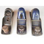 Three Record woodworking block planes comprising No 0110, 0120 and 0220