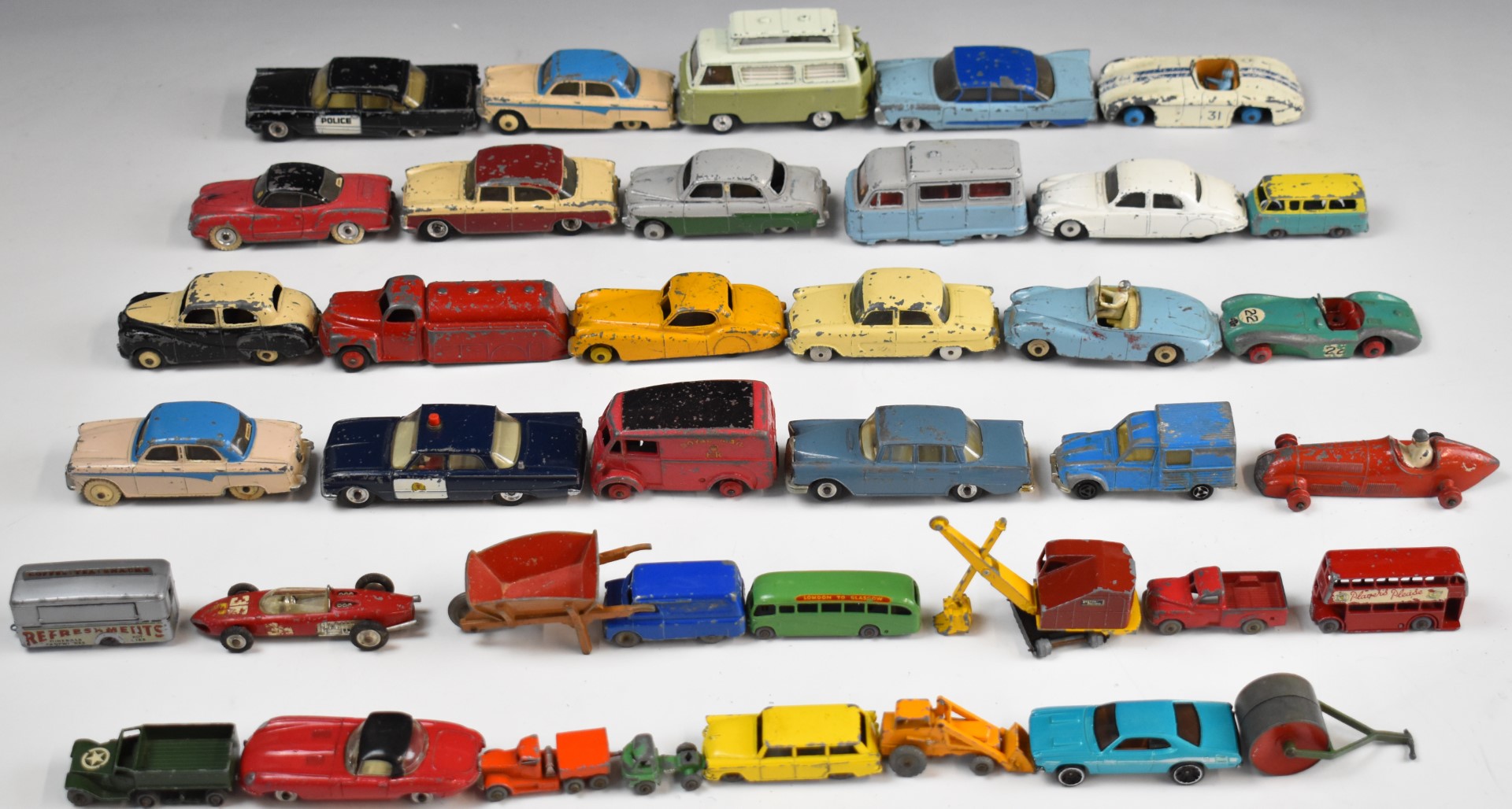 A collection of vintage Dinky, Corgi and similar diecast model vehicles to include Humber Hawk