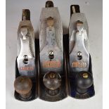 Set of three Record woodworking smoothing planes comprising No 04 1/2, 04 and 03