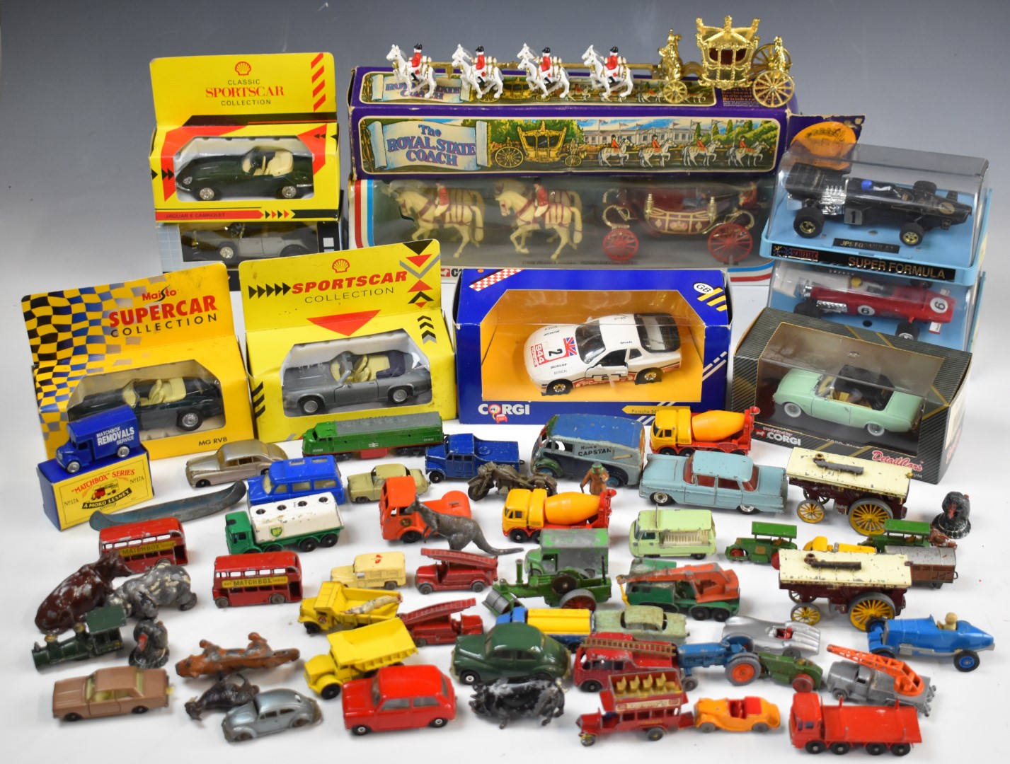 A collection of loose and boxed diecast model cars including Corgi, Dinky, Lesney Matchbox and