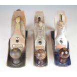 Set of three Record woodworking smoothing planes comprising No 04 1/2, 04 and 03