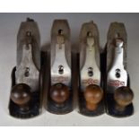 Four Woden woodworking planes comprising three W4 and one W 4 1/2