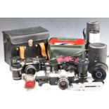 Three 35mm SLR cameras, lenses and accessories including Jenaflex AM-1 with 50mm 1:1.8 and 70-