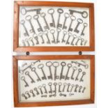 Two framed displays of vintage keys, largest key approximately 14cm long, each case 35 x 57cm.