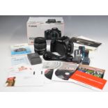 Canon EOS 400D digital camera with 18-55mm 1:3.5-5.6 lens, in original box with charger, batteries