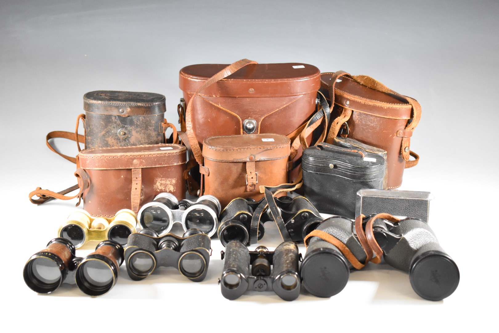 Eight various pairs of binoculars to include Swift 8.5 x 44, Dollond opera or horse glasses, bone