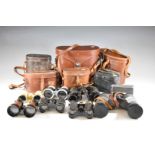 Eight various pairs of binoculars to include Swift 8.5 x 44, Dollond opera or horse glasses, bone
