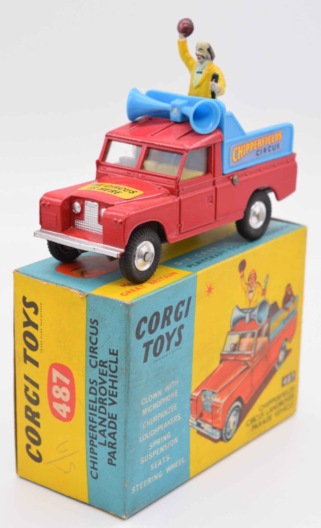 Corgi Toys diecast model Chipperfields Circus Landrover Parade Vehicle with red body, lemon