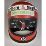 Niki Lauder Heuer novelty desk clock formed as a motor racing helmet, height 11.5cm