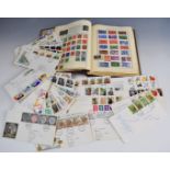 The Meteor stamp album containing GB and world mint and used stamps and a collection of loose GB and