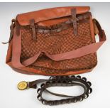 Leather game bag and shotgun cartridge belt.