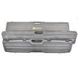 Three rifle or shotgun hard carry or flight cases GunGuard, Mannlicher and Doskocil, all with padded