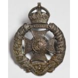 British Army Rifle Brigade metal badge with last battle honours dating from the Boer War