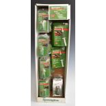 A large collection of Remington shotgun or rifle cleaning accessories in a branded card shop