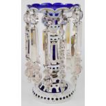 Victorian overlaid and cut glass drop lustre vase with gilt decoration and white casing over blue