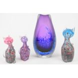 Three Svaja glass cats together with a Jane Charles studio glass vase with blue mottled