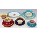 Aynsley decorative teaware comprising two trios, three cups and saucers and cake plate and four cups