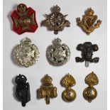 Ten British Army Infantry cap badges including the Tyneside Irish Army Cyclist Corps, Rifle