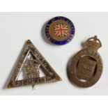 Three WW1 badges comprising 'On War Service' 1915, number 43867, Gaunt & Co. London, 'On War