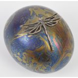 John Ditchfield for Glassform iridescent glass paperweight with applied white metal dragonfly,