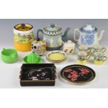 A collection of Carltonware including two vintage teapots, teapot stand, tobacco jar decorated