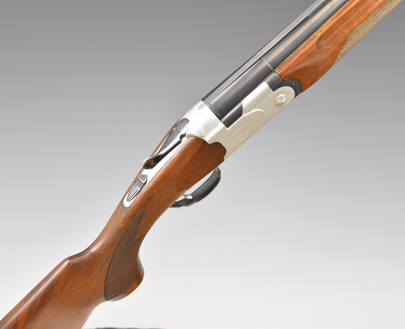 Beretta S685E 12 bore over and under ejector shotgun with engraved lock, underside, trigger guard,