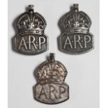 Three hallmarked silver Air Raid Precaution (ARP) badges