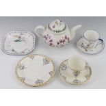 Two Shelley porcelain trios and a Portmeirion teapot decorated in the Botanic Garden pattern