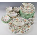 Minton dinner and tea ware decorated in Haddon Hall pattern, includes four tea / coffee pots,