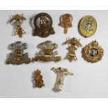 Ten British Army Cavalry Regiment badges including 10th Royal Hussars, 11th Hussars and 9th Lancers