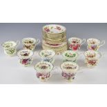 A collection of Royal Albert tea ware including multiple trios from the Flower of the Month series