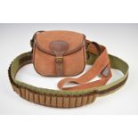 Canvas and leather shotgun cartridge bag and belt.