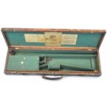 Westley Richards leather bound oak fitted shotgun case with three original labels, 84 x 25 x 9.5cm.